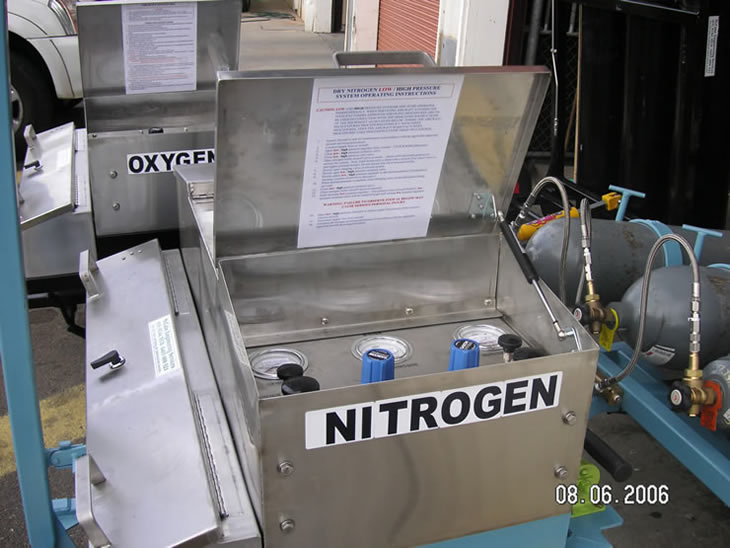 2 compressed gas bottle carts, one for nitrogen and one for oxeygen